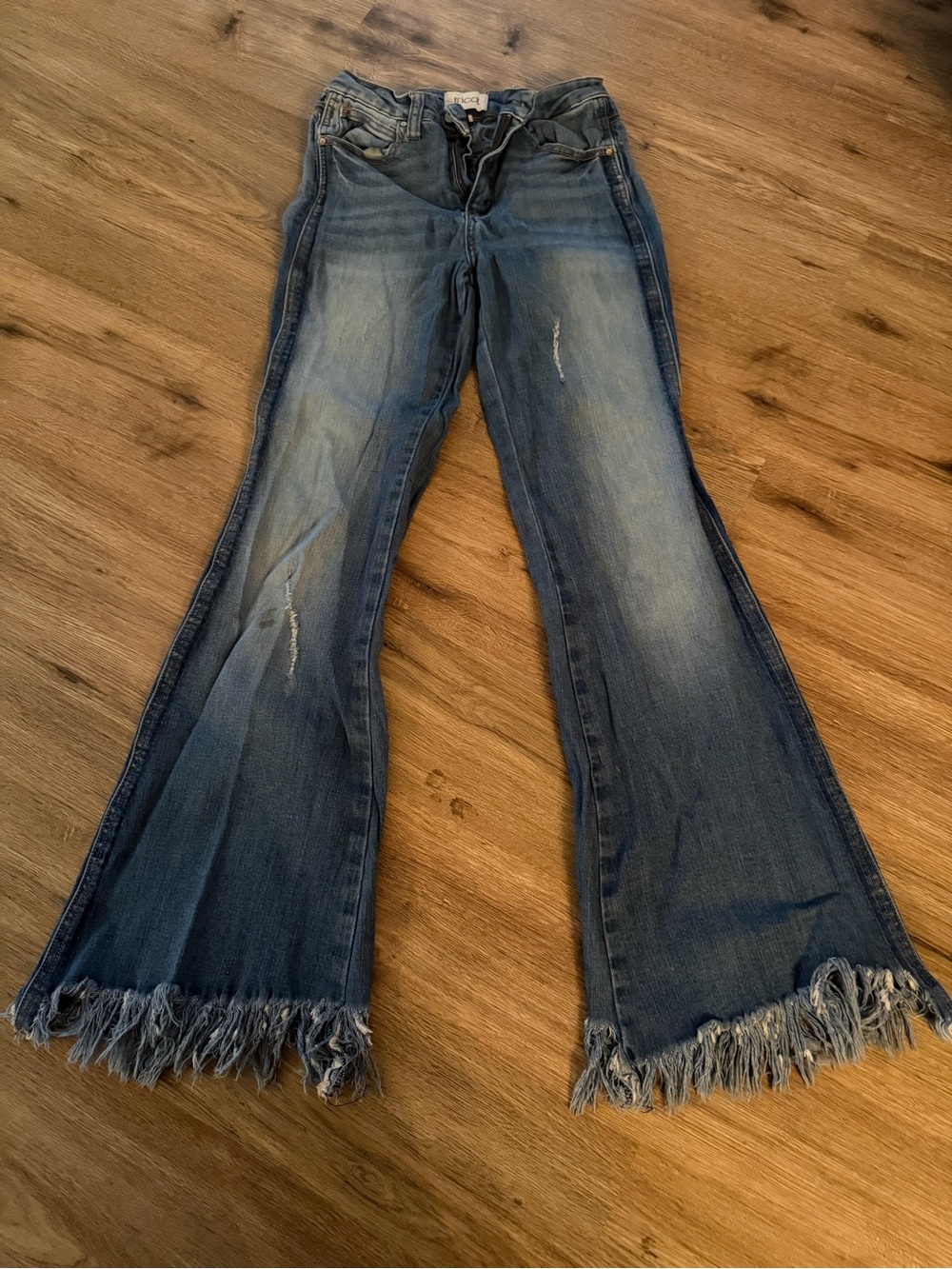 Women’s Blue Distressed Flare Jeans with Frayed Hem